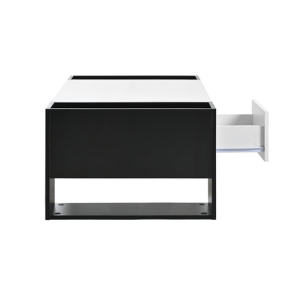 Moderner Couchtisch 105 x 60 x 40,5 cm – Schwarz-Weiß-Design mit hochglänzender Oberfläche, Schublade und 4 offenen Fächern